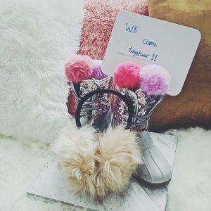 Rain and snow boots and ear winter ear muffs